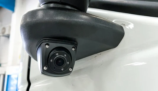black HGV side view camera mounted on wing mirror