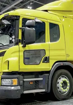 front view of mirror on yellow hgv